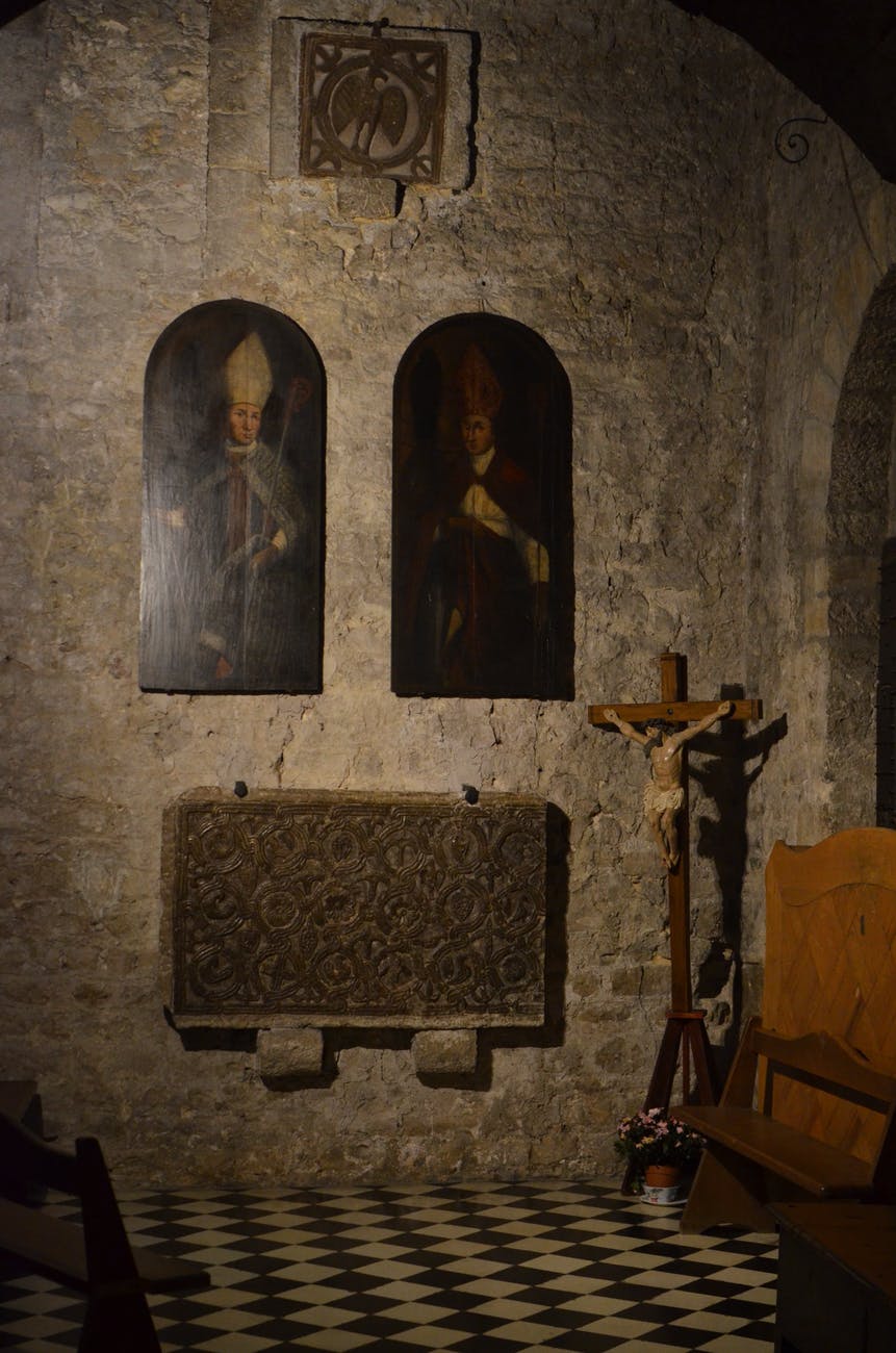 icons and crucifix in old stone church